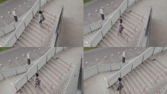 俯拍都市女青年 快步走在办公楼楼道阶梯上高清在线视频素材下载