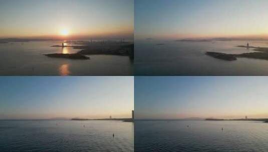 夕阳下的青岛海滨与城市海东大厦高清在线视频素材下载