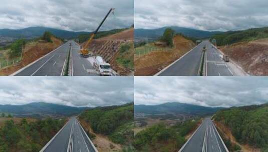 公路建设视频山区高速公路挡土墙吊装施工高清在线视频素材下载