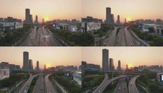 夕阳下城市里立交桥高架桥汽车流交通航拍高清在线视频素材下载