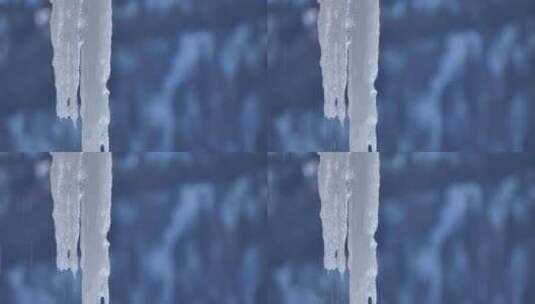 融化的冰柱孤立在黑暗的背景高清在线视频素材下载