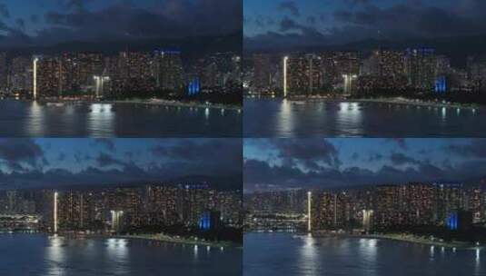 美丽的城市景观滨海湾城市黄昏檀香山城市灯高清在线视频素材下载