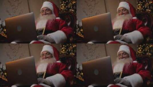 微笑的现代圣诞老人使用笔记本电脑为儿童填高清在线视频素材下载