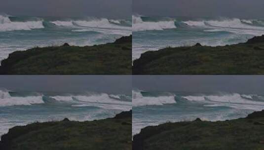 在阴天暴风雨的日子里，猛烈的海浪向岸边移高清在线视频素材下载