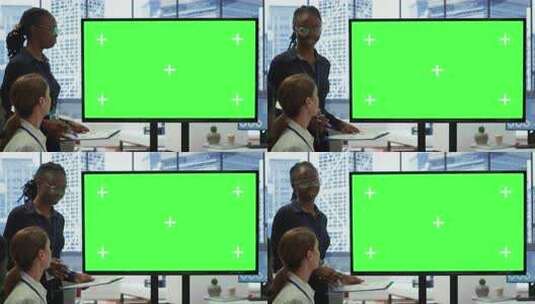 多元化的工作团队以绿色大屏幕讨论企业战略高清在线视频素材下载
