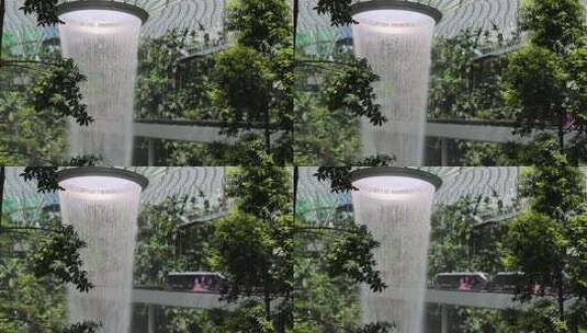 新加坡樟宜机场瀑布与网红小火车高清在线视频素材下载