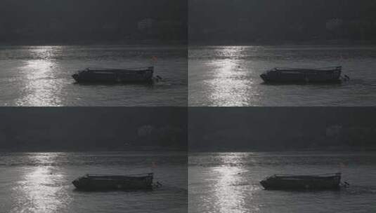 水面上的渔船夕阳景象高清在线视频素材下载