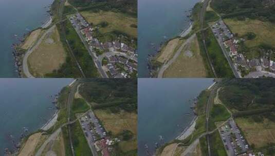 空中自上而下拍摄的客运列车沿着悬崖驶向格高清在线视频素材下载