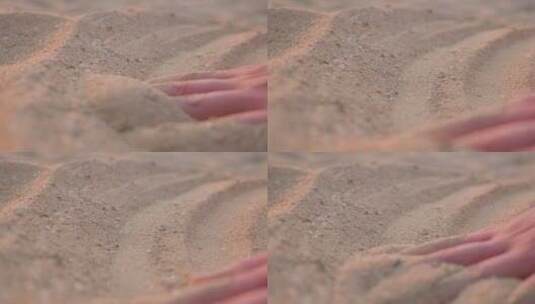 手抚摸沙子高清在线视频素材下载