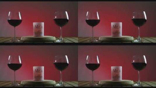 蜡烛旁的两杯红酒高清在线视频素材下载