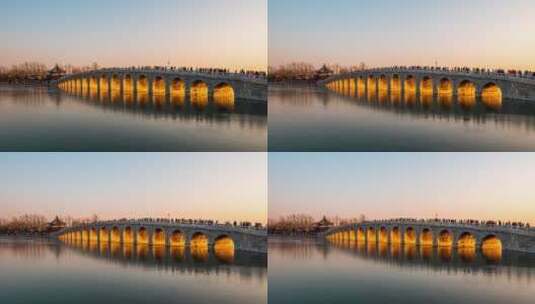 颐和园十七孔桥金光穿洞北京延时冬天古建高清在线视频素材下载