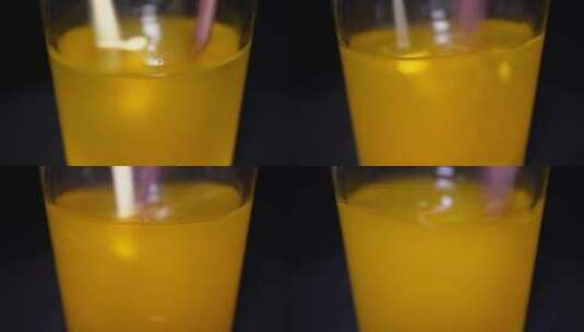 橙子果汁橘子果汁清水玻璃杯冲泡高清在线视频素材下载