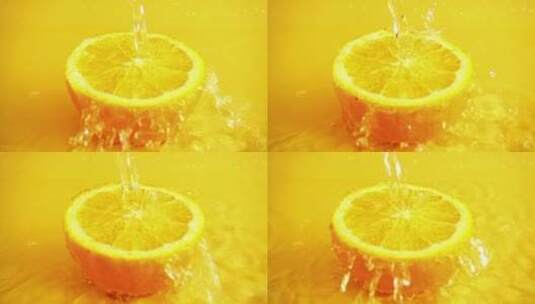 水从橘子上流下高清在线视频素材下载
