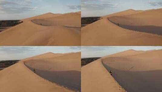 航拍沙漠徒步旅行者高清在线视频素材下载