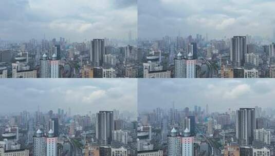 航拍武汉市中心高楼群与立体交通轻轨列车高清在线视频素材下载