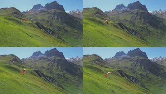 山谷上空的滑翔伞运动高清在线视频素材下载
