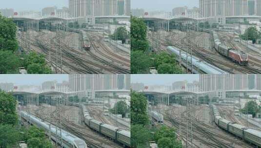郑州火车站-动车与绿皮车的交汇高清在线视频素材下载