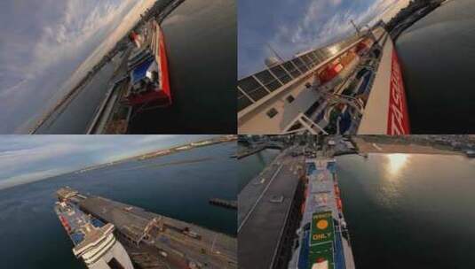 FPV穿越机无人机航拍游轮停靠码头大海日落高清在线视频素材下载