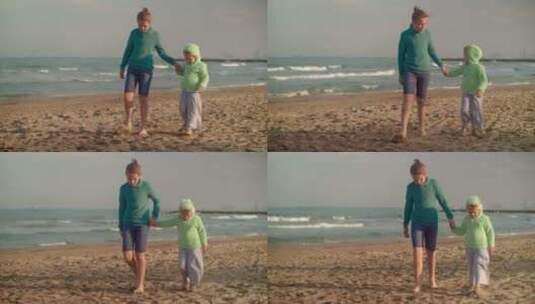海边散着步的母女高清在线视频素材下载