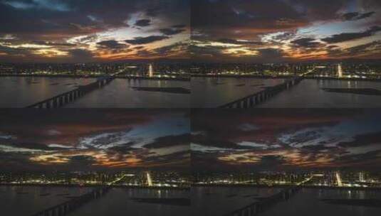 唯美日落火烧云下的城市高铁大桥航拍延时高清在线视频素材下载