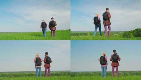 情侣在草原上徒步旅行高清在线视频素材下载