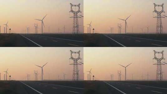 夕阳黄昏下公路两旁的风力发电机组高清在线视频素材下载