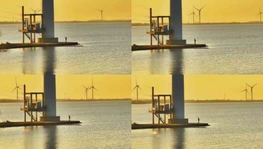 航拍夕阳湖泊风力发电机组乡村振兴环保能源高清在线视频素材下载