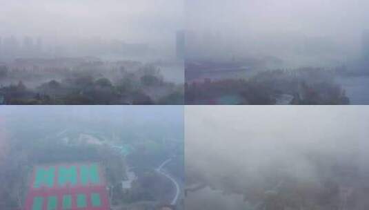 航拍雾霾中的龙潭公园高清在线视频素材下载