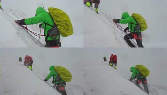 风雪中攀登四川贡嘎山区贡巴峰的登山者高清在线视频素材下载