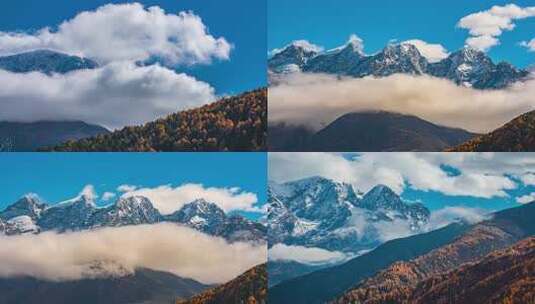 云雾缭绕的壮美雪山景观高清在线视频素材下载