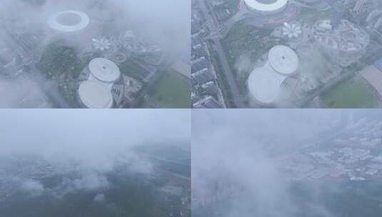 航拍枣庄新城云雾缭绕的枣庄双子星体育中心 (1)高清在线视频素材下载