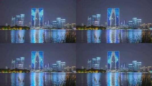 苏州金鸡湖和东方之门城市建筑夜景灯光高清在线视频素材下载