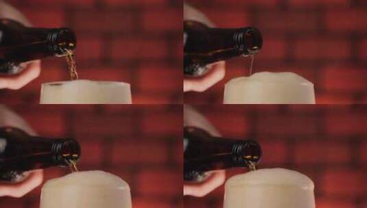 啤酒倒入杯子涌入时泡沫溢出高清在线视频素材下载