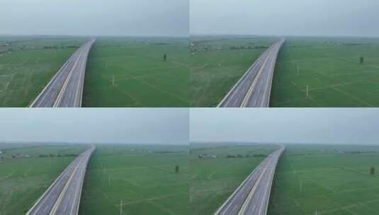 最美生态公路航拍鄱阳湖大道鄱阳湖公路道路高清在线视频素材下载