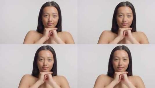 混合种族亚洲模型在工作室美容拍摄高清在线视频素材下载