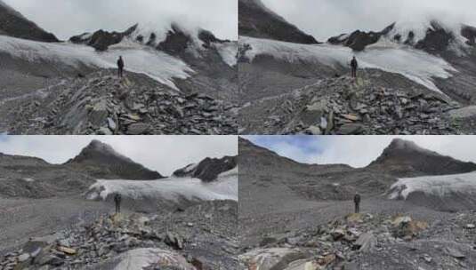 航拍攀登川西贡嘎山卫峰乌库楚雪山的登山者高清在线视频素材下载