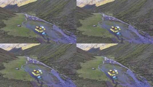 航拍攀登横断山脉乌库楚雪山的登山者大本营高清在线视频素材下载