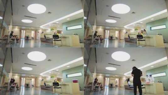 医院医护人员护士站接待看病病人人流延时摄高清在线视频素材下载