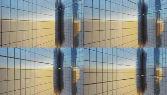 阳光下现代玻璃摩天大楼外观高清在线视频素材下载