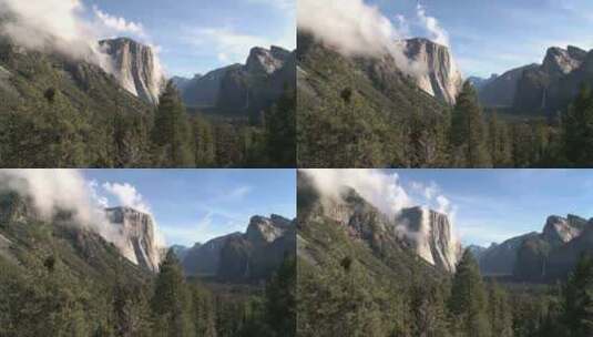 云雾缭绕在山顶绿色森林高清在线视频素材下载