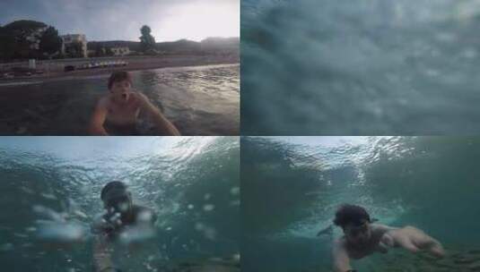 男子在游泳时拿着水下摄像机拍摄高清在线视频素材下载
