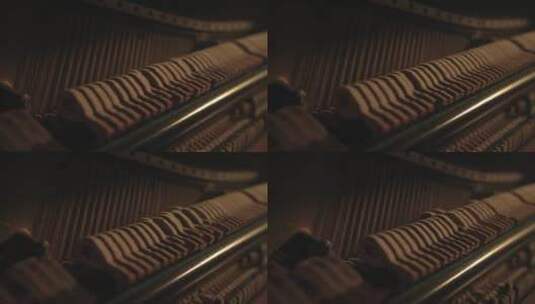 钢琴琴锤击弦的特写镜头高清在线视频素材下载