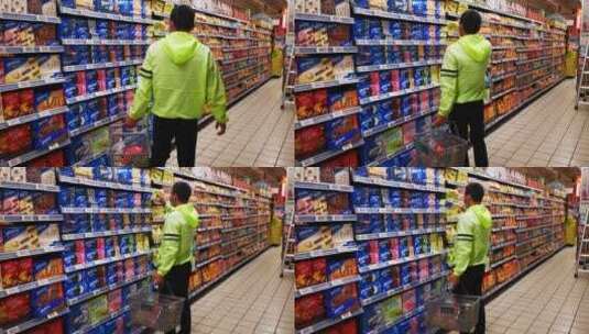 实拍超市购物挑选商品背影高清在线视频素材下载