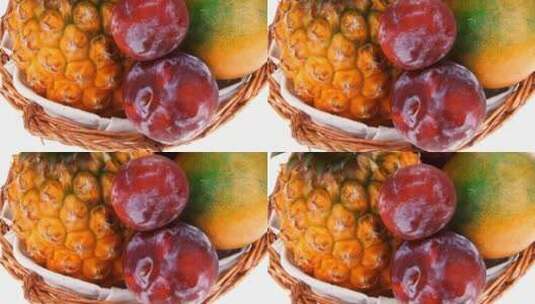 许多新鲜的热带水果包括菠萝李子和芒果高清在线视频素材下载
