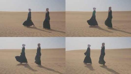 妇女一起走在沙漠里高清在线视频素材下载