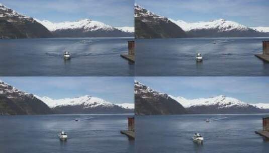 游船行驶在冰山下的大河上高清在线视频素材下载