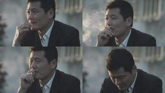 中年男子抽烟高清在线视频素材下载