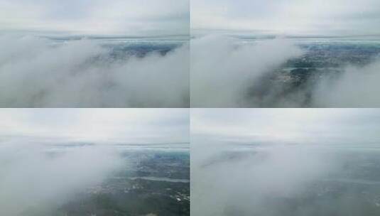 4k航拍穿越城市上空云层高清在线视频素材下载