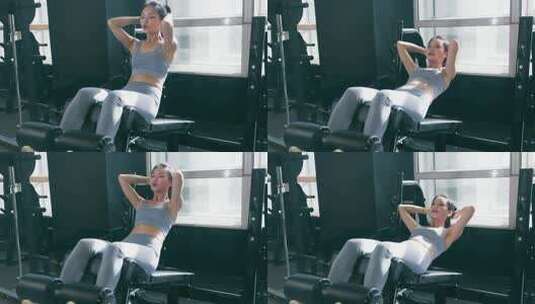 女性穿运动内衣在健身房锻炼高清在线视频素材下载