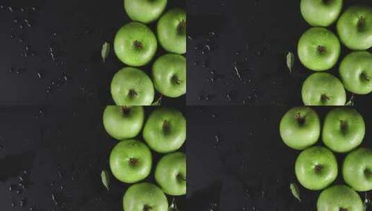 用水滴旋转新鲜的青苹果高清在线视频素材下载